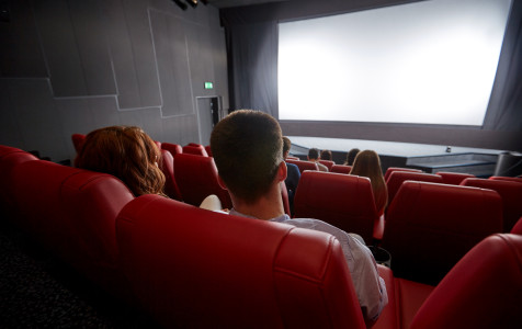 cinema-entertainment-leisure-people-concept-couple-watching-movie-theater-from-back.jpg