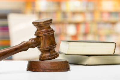 wooden-gavel-books-wooden-table.jpg